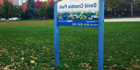 David Crombie Park sign in a field